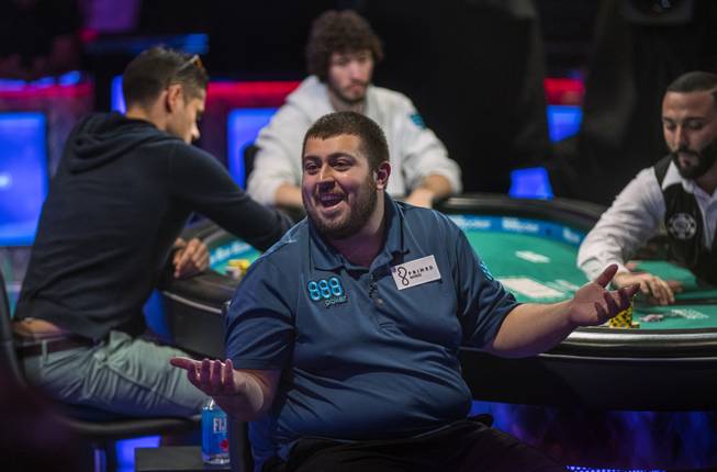 Scott Blumstein is pleased with another big pot win during the last night of the WSOP to finish poker's world championship as the table goes from 3 to a winner at the Rio on Saturday, July 22 2017.