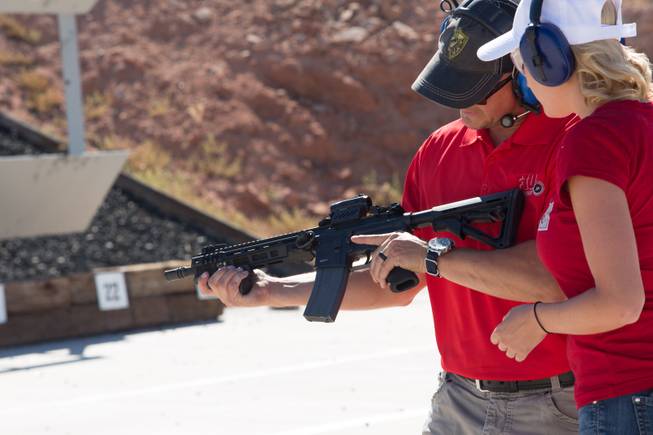 FBI Firearms Instructor Chris McInnes gives a quick overview on the proper way to handle and manipulate an M4 rifle during a firearms demonstration at the FBI shooting complex, Friday June 16, 2017.