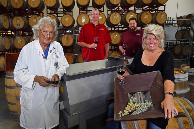 The Grape Expectations team from left, KJ Howe, professor of yeastology, Mike Schoenbaechler, winemaker/owner, Chad Evans, head of production and Patty Peters, chief wine wench/owner, at the winemaking school in Henderson Tuesday, July 25, 2017. 