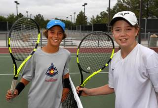 Nikola Dobrijevic, left, and Rocco Mendez, both 11, pose before practice at the No Quit Tennis Academy in Lorenzi Park Tuesday, July 25, 2017.
