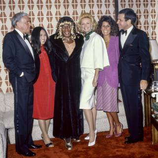 From left, Frank Sinatra, unknown, Flip Wilson, Barbara Sinatra, Tina Sinatra and Frank Sinatra Jr. are seen July 27, 1980 at the Sahara in Las Vegas.