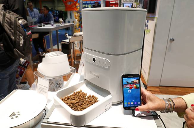 A Petmate Internet-enabled treat dispenser is displayed during the 2017 SuperZoo, a convention for pet retailers, at the Mandalay Bay Convention Center Tuesday, July 25, 2017.