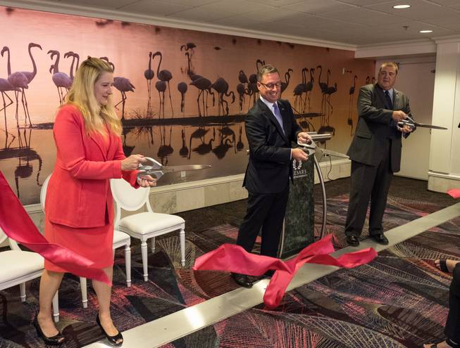 The renovation of the Flamingo's meeting halls is celebrated this week. From left are Eileen Moore, regional president of the Cromwell, Ling and Flamingo; John Schreiber, LVCVA senior director of business sales; and Michael Hartman; executive director of catering and convention services for Caesars Entertainment.