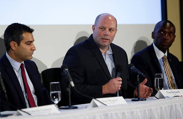 Tim Richards, center, senior vice president payments innovation for Everi, speaks during a Responsible Gaming Panel at UNLV Thursday, Aug. 3, 2017.  With Richards are Dan Shapiro, left, vice president of strategy & business development for William Hill Race & Sports Book, and Terry Johnson, a member of the Nevada Gaming Control Board.