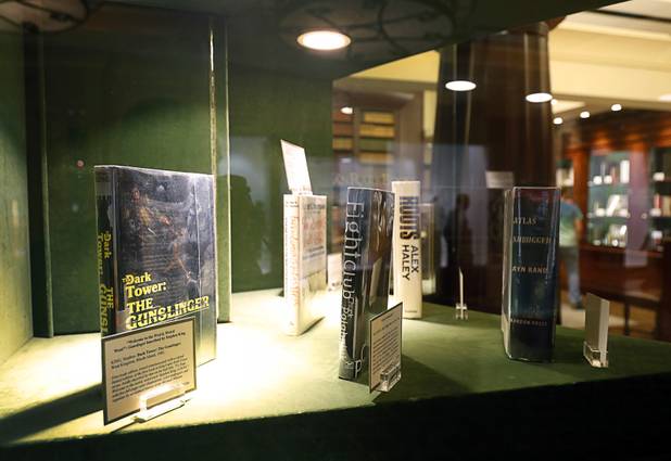 Books are displayed Bauman Rare Books at the Shoppes at the Palazzo on the Las Vegas Strip Tuesday, Aug. 8, 2017. The book at left is a 1982 first-edition, signed copy of "Dark Tower: The Gunslinger" by Stephen King.