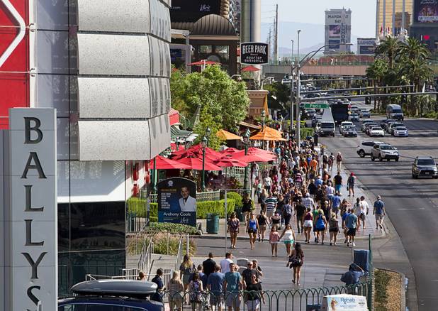 Pedestrians are shown on the Las Vegas Strip Tuesday, Aug. 8, 2017.