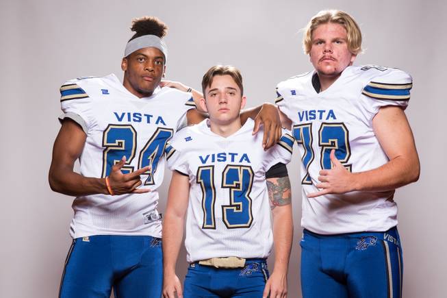 Members of the Sierra Vista High School football team, from left, Kevin McCray, Jaxson Zibert and  Brendan Bentley pose for a portrait at the Las Vegas Sun's high school football media day August 2, 2017, at the South Point.