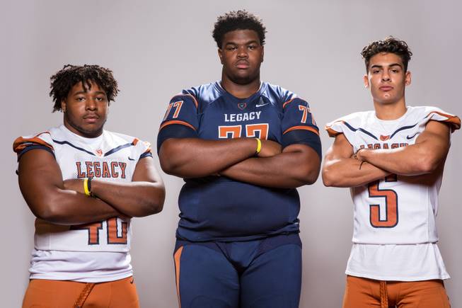 Members of the Legacy High School football team, from left, Amere Foster, Terrence Smith and Roberto Valenzuela pose for a portrait at the Las Vegas Sun's high school football media day August 2, 2017, at the South Point.