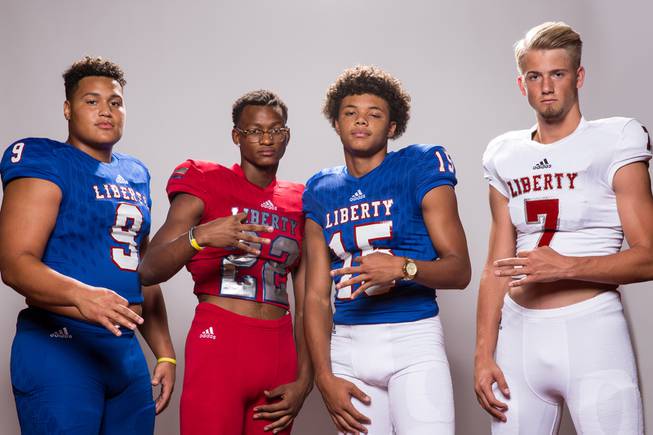 Members of the Liberty High School football team, from left, Crishaun Lappin, Allan Mwata, Octavian Bell and Kenyon Oblad pose for a portrait at the Las Vegas Sun's high school football media day August 2, 2017, at the South Point.
