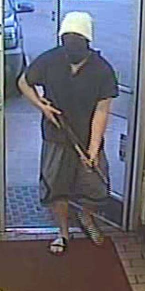 Metro Police say this man, who was wearing a Clark County Detention Center shirt, is wanted in the robbery of a business in the 5000 block of West Charleston Boulevard on Tuesday, Aug. 15, 2017.
