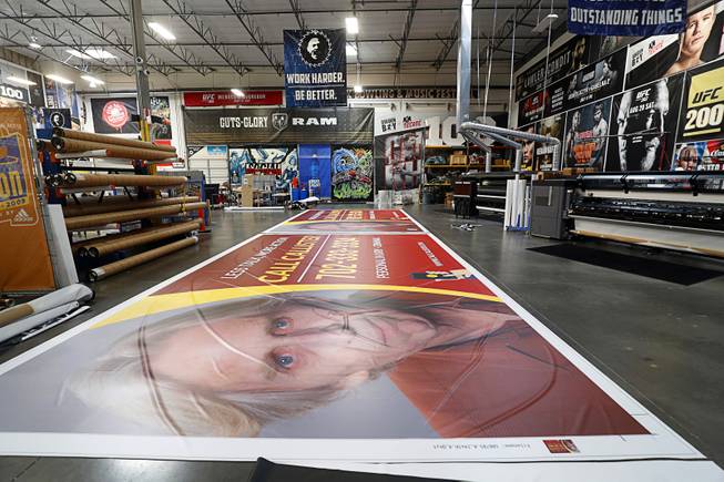 A billboard wrap is shown on the shop floor at Screaming Images Wednesday, Aug. 16, 2017. The company is a graphic design, print and installation business.