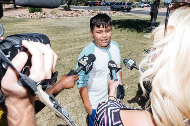Student Ricky Osorio Rafael, 11, speaks with media outside Thurman White Middle School in Henderson following a stabbing in which a student from another school was injured on Friday, Aug. 18, 2017.