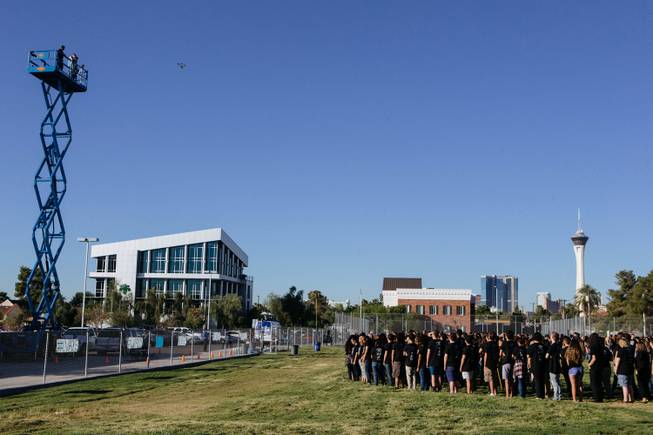 Students pose for a photo during its Silver Anniversary celebration at Las Vegas Academy of the Arts on August 18, 2017. Approximately 1,700 students and 150 staff members posed for a photo spelling out LVA25 on the field.