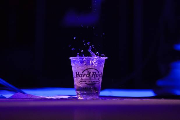The heavy bass from Fisters performance causes the content of one of their drinks sitting on the stage floor to splash out during the Psycho Festival at the Hard Rock Hotel and Casino Friday, Aug. 18, 2017.