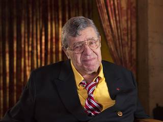 FILE - In this April 12, 2014, file photo, actor and comedian Jerry Lewis poses during an interview at TCL Chinese Theatre in Los Angeles. Lewis, the comedian and director whose fundraising telethons became as famous as his hit movies, has died. Lewis died Sunday, Aug. 20, 2017, according to his publicist. He was 91. (Photo by Dan Steinberg/Invision/AP Images, File)