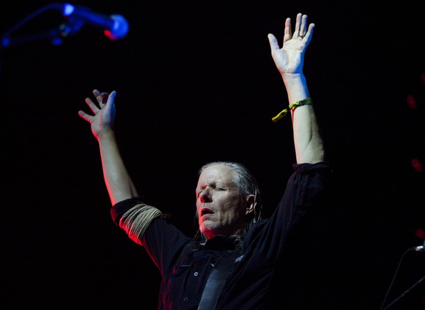 Swans frontman Michael Gira raises his arms as he conducts the band during their set at  the Psycho Festival at the Hard Rock Hotel and Casino, Sunday, Aug 20, 2017.