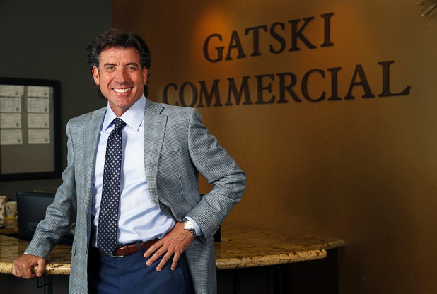 Frank Gatski, president/CEO of Gatski Commercial Real Estate, poses in the lobby of the company's offices Tuesday, Aug. 29, 2017.