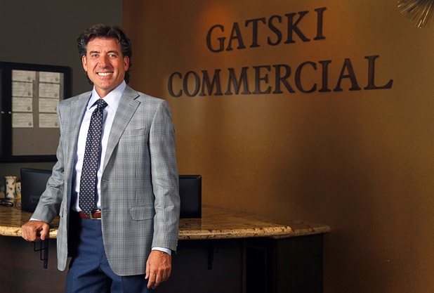 Frank Gatski, president/CEO of Gatski Commercial Real Estate, poses in the lobby of the company's offices Tuesday, Aug. 29, 2017.