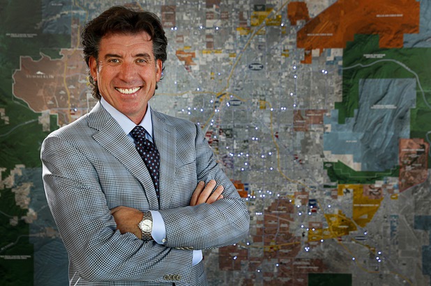Frank Gatski, president/CEO of Gatski Commercial Real Estate, by a map of Las Vegas at the company Tuesday, Aug. 29, 2017.