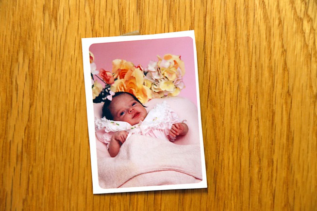A photo of Eddie Gomez' daughter, born after his death, ...