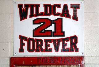 A sign over a locker room door pays tribute to #21 Eddie Gomez at Las Vegas High School Thursday, Sept. 7, 2017. Gomez, a player with the Las Vegas High School football team, died in 2003, two days after suffering a head injury in a playoff game.