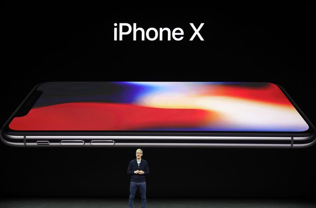 Apple CEO Tim Cook announces the new iPhone X at ...