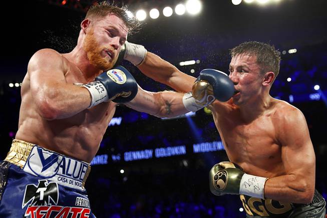 Canelo Alvarez of Mexico and WBC/WBA/IBF middleweight champion Grennady Golovkin of Kazakhstan during their title fight at T-Mobile Saturday Saturday, Sept. 16, 2017.
