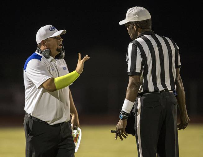 Basic head coach Jeffrey Cahill questions another penalty call as ...