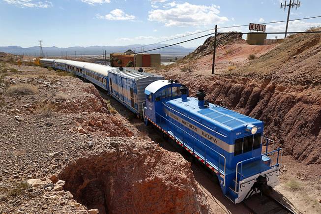 A Nevada Southern Railway train is shown on the tracks behind the Railroad Pass hotel-casino Sunday, Sept. 17, 2017.