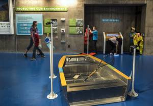 Visitors experience the interactive learning stations at Springs Preserve's new permanent exhibit, Waterworks, which highlights the inner workings of the valley's water treatment and delivery system, Friday, Sept. 15, 2017.