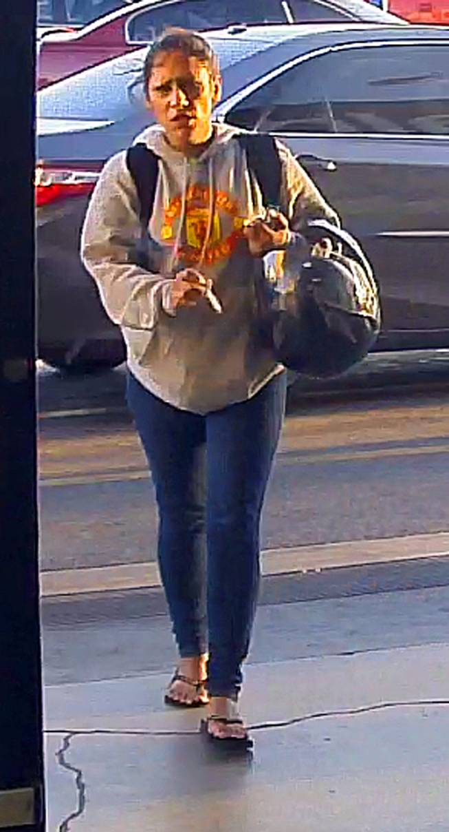 This woman is wanted in a Las Vegas purse snatching that left the victim injured.