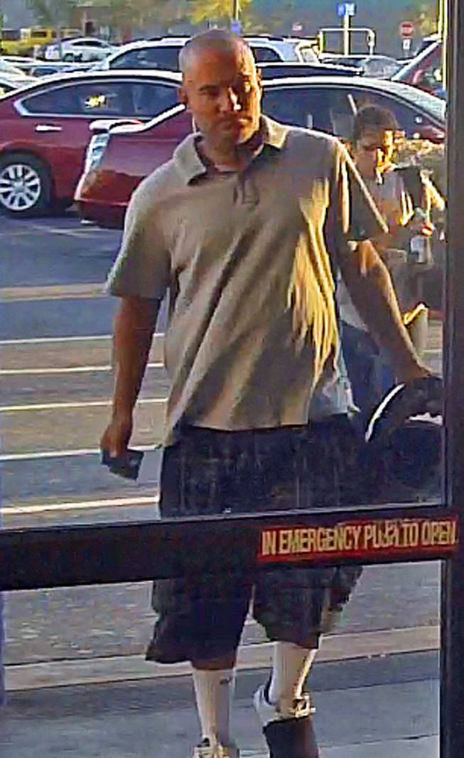 This man is wanted in a Las Vegas purse snatching that left the victim injured.