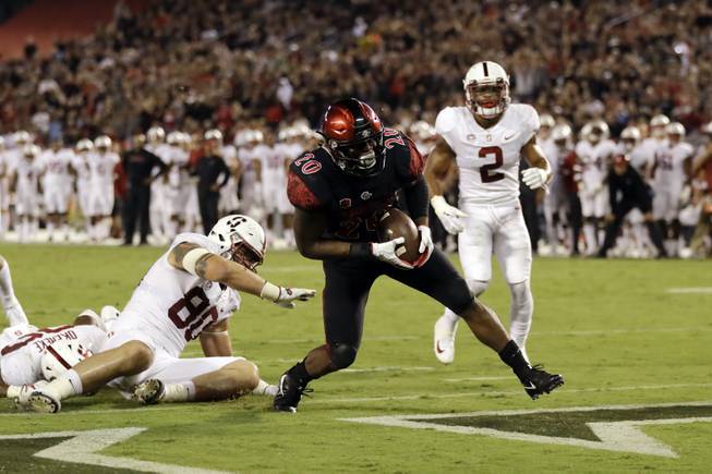 San Diego State running back Rashaad Penny scores a touchdown during the first half of an NCAA college football game against Stanford on Saturday, Sept. 16, 2017, in San Diego. (AP Photo/Gregory Bull)