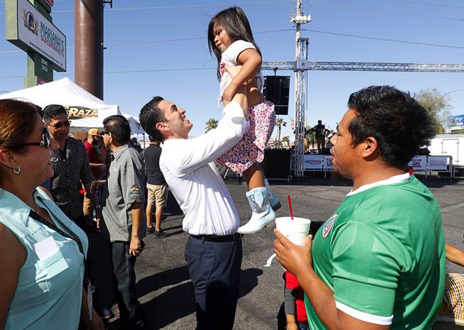 Congressman Ruben Kihuen (D-Nev) holds up Ruby Estrada, 4, during an earthquake relief event in front of Mariana's Supermarket at West Sahara Avenue Sunday, Sept. 24, 2017. Marianas Charity Foundation hosted the event to raise donations for victims of the recent devastating earthquake in Central Mexico. The foundation promised to match donations, dollar for dollar, up to $20,000, said Ruben Anaya, COO of Mariana's Supermarkets.