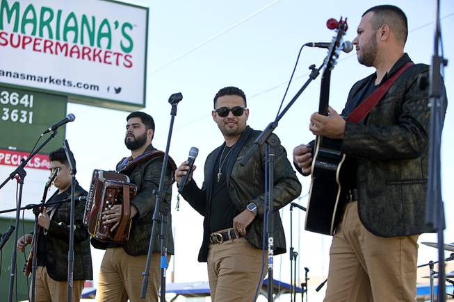 Grupo 5ta Generacion performs during an earthquake relief event in front of Mariana's Supermarket at West Sahara Avenue Sunday, Sept. 24, 2017. Ten local bands donated their time to perform the event to raise donations for victims of the recent devastating earthquake in Central Mexico, said Ruben Anaya, COO of Mariana's Supermarkets.