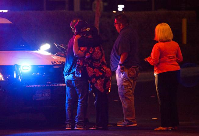 People arrive at Metro Headquarters to check on loved ones Metro Police headquarters early Monday morning after a mass shooting at a music festival on the Las Vegas Strip Sunday, Oct. 1, 2017.