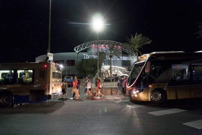 People load into buses destined to different Strip Casinos following a mass shooting at the Route 91 music festival along the Las Vegas Strip, Monday, Oct. 2, 2017. Multiple victims were being transported to hospitals after a shooting late Sunday at a music festival on the Las Vegas Strip. UNLV's Thomas & Mack Center was opened as a place of refuge.