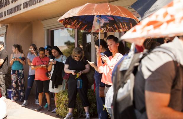 People wait to donate blood at the United Blood Services location on Whitney Ranch Drive, Monday, Oct. 2, 2017, after a mass shooting on the Las Vegas Strip.