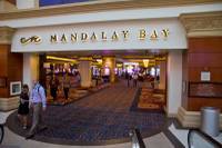 MGM Resorts International is laying off workers at Mandalay Bay because of the economic effects of the Oct. 1 shooting ...
