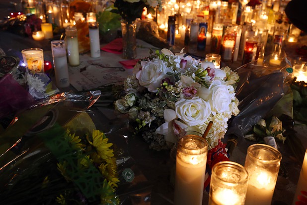 Flowers are shown at a makeshift memorial for shooting victims at the Las Vegas Strip and Sahara Avenue Wednesday, Oct. 4, 2017.