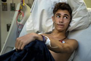 Nick Campbell, 16, recovers from a gunshot wound at UMC received Sunday night during the mass shooting at the Route 91 Harvest festival on Wednesday, October 4, 2017.   He's forever grateful for the stranger who triaged him and likely saved his life. .