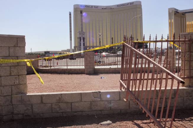 Haven Street, located behind the parking lot for the Route 91 Harvest music festival grounds on the Las Vegas Strip where a gunman killed 58 people and injured more than 500, shows evidence of what ensued that night as concertgoers tried to escape days later, Thursday, Oct. 5, 2017.