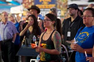 A vigil for the victims in the Route 91 Havest Festival is held during First Friday in Downtown Las Vegas, Friday OCt. 6, 2017.