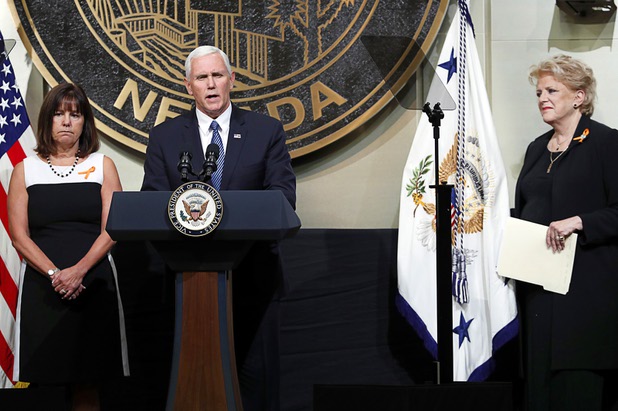 U.S. Vice President Mike Pence is joined by his wife, Karen, left, and Las Vegas Mayor Carolyn Goodman as he speaks in Las Vegas City Hall following a Unity Prayer Walk Saturday, Oct. 7, 2017.