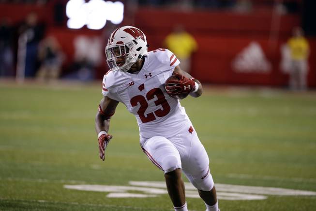 Wisconsin running back Jonathan Taylor (23) carries the ball during the first half of an NCAA college football game against Nebraska in Lincoln, Neb., Saturday, Oct. 7, 2017. 