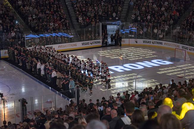 First responders and medical personnel involved in the October 1st tragedy are backed by the Vegas Golden Knights and Arizona Coyotes for 58 seconds of silence before the Knights home opener Tuesday, Oct. 10, 2017, at the T-Mobile Arena. The Knights won 5-2 to extend their winning streak to 3-0.