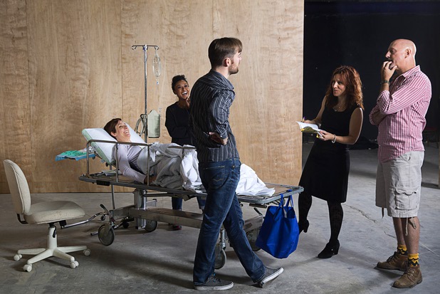 Co-directors Ann-Marie Pereth and Joseph Kucan work with actors in a scene from "W;t" during rehearsal at the Public Fit Theatre, 100 South Maryland Parkway, Wednesday Oct. 11, 2017.