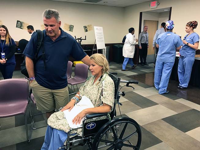 Lori Kammer, injured in the mass shooting on the Las Vegas Strip on Oct. 1, 2017, and her husband, Todd, are employees of the Los Angeles County Sheriff’s Department. In this Oct. 12, 2017, file photo, she is pictured at Sunrise Hospital and Medical Center.
 