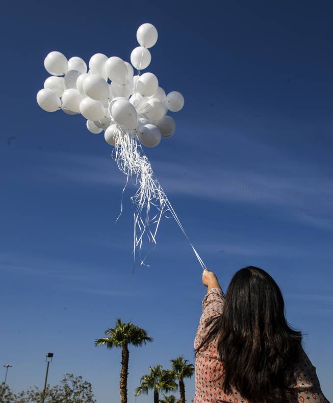 Lisa Schachtel Kodimer is in Las Vegas performing 58 acts of kindness in honor of the mass shooting 58 victims, one a balloon release near Party City Friday, October 13, 2017.