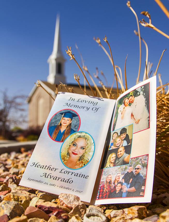 A program for Heather Alvarado's funeral sits outside the Enoch LDS stake center where the funeral services were held on Friday, Oct. 13, 2017. Heather Alvarado was one of the victims in the Las Vegas shooting. (Jordan Allred  /The Spectrum via AP)